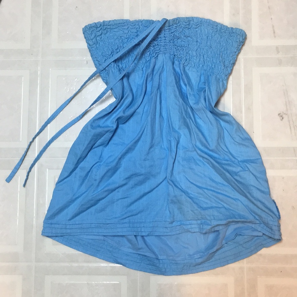 Cute blue tie up shirt.